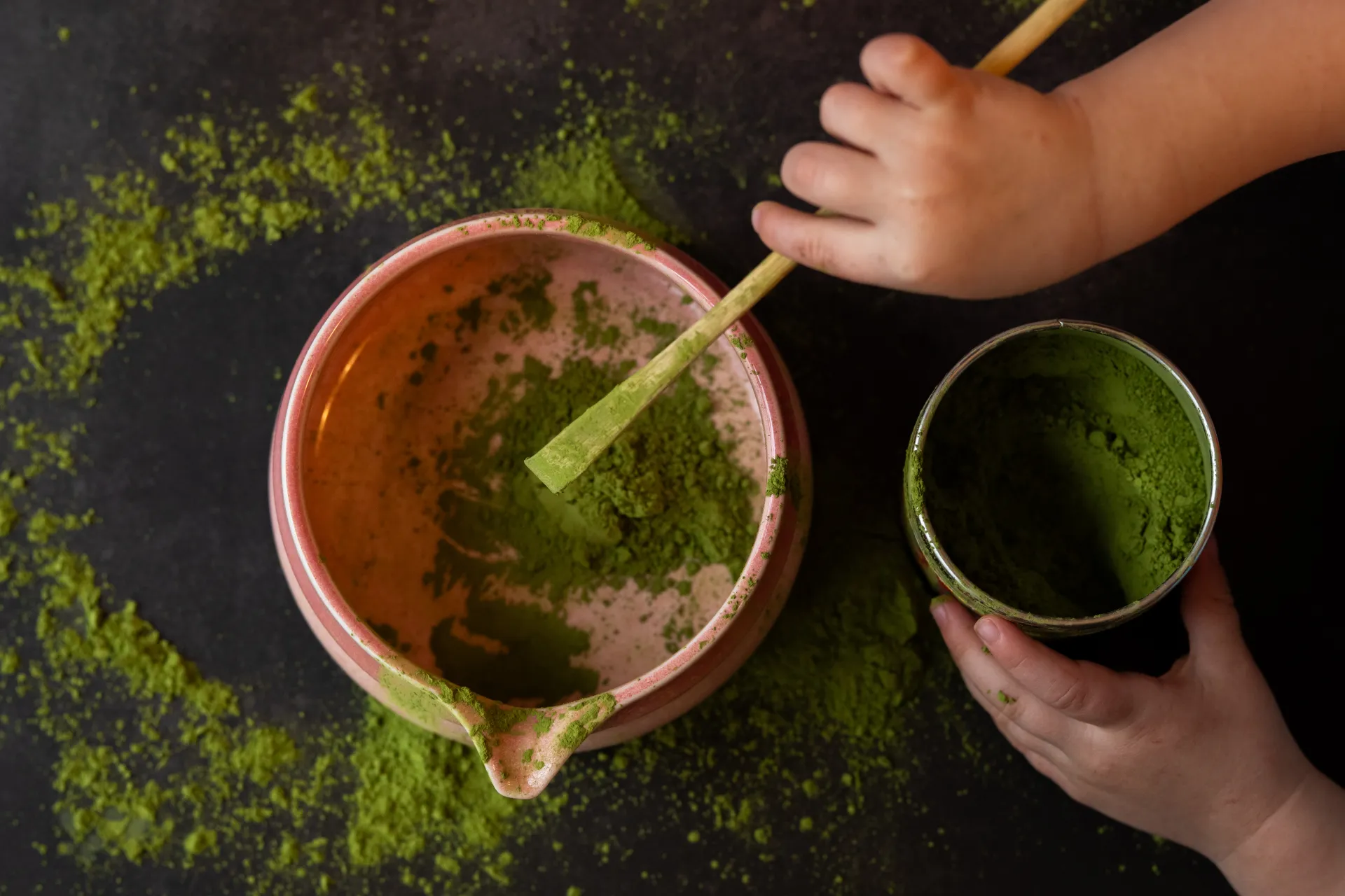 The matcha whisking process