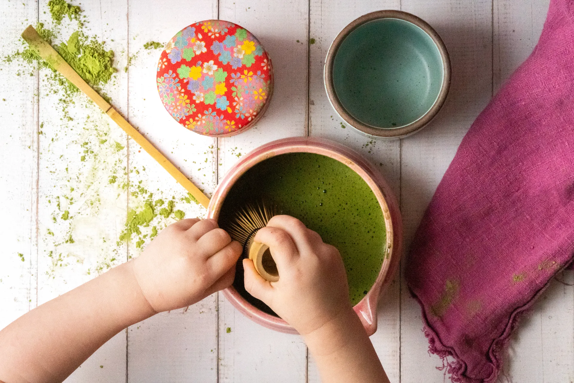 Little hands whisking matcha